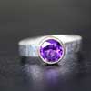 A Beautiful Solitaire African Amethyst This ring is totally Handmade. A Beautiful Solitaire African Amethyst used in centre. All the impression on silver is all handmade. Metal used is Sterling Silver & 18K Gold.